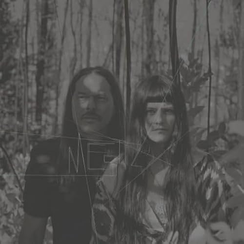 Black and white portrait of two people in a forest, with text overlay.
