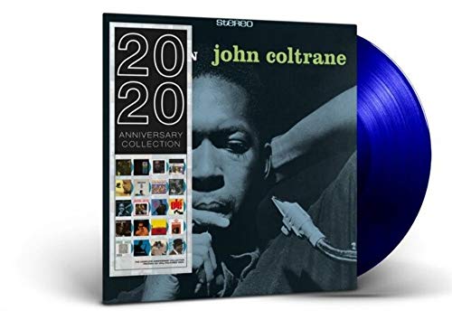 John Coltrane “Blue Train” vinyl LP with blue record beside cover.