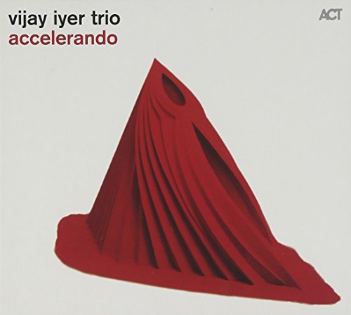 CD cover for Vijay Iyer Trio’s “Accelerando” featuring abstract red shapes.