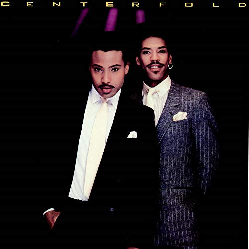 Album cover for Centerfold featuring two formally dressed men.