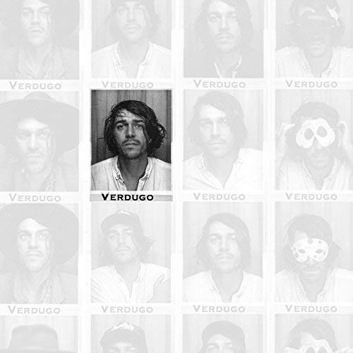 Grid of black and white photo booth portraits of a man, one highlighted.