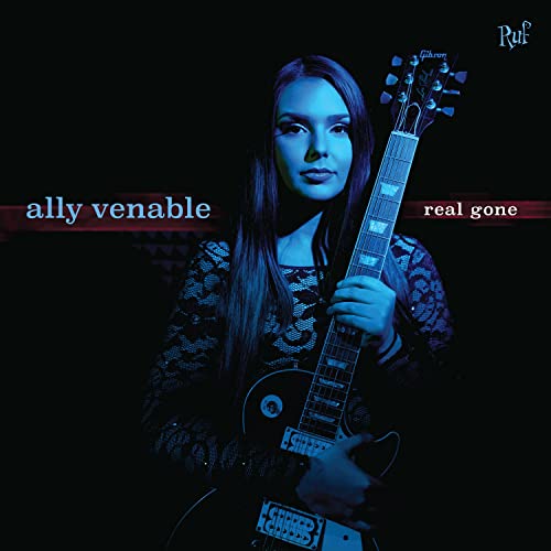 Ally Venable album cover: woman with guitar, dark background.