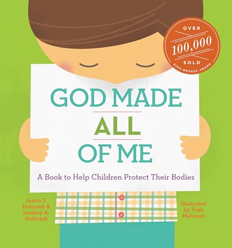 Book cover with child holding sign reading "God Made All of Me.