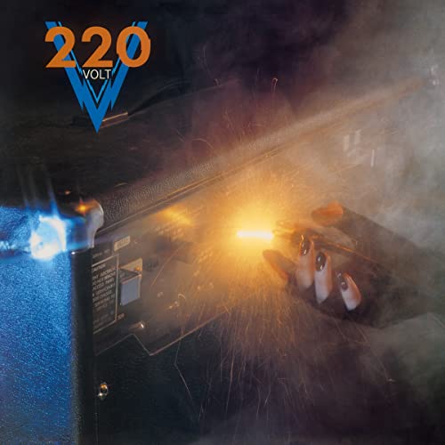 220 Volt album cover featuring welding sparks and electrical equipment.