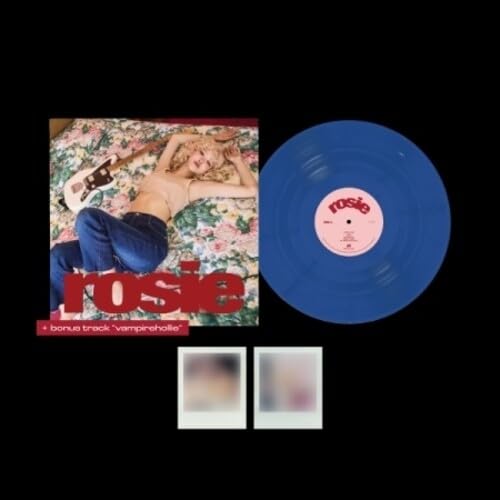 Vinyl record with album cover featuring a person lying on floral bedding.