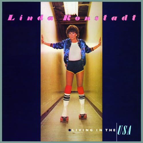 Linda Ronstadt on roller skates, album cover with pink and blue borders.