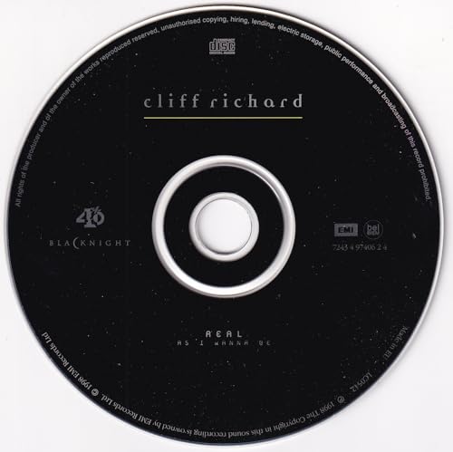 Black CD with "Cliff Richard" and "Real As I Wanna Be" text.