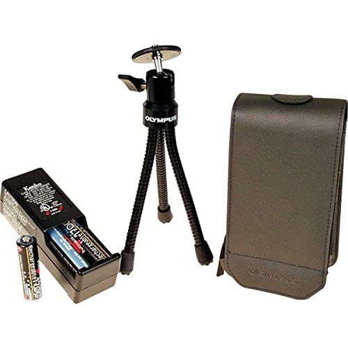Olympus digital voice recorder with tripod, case, and batteries.