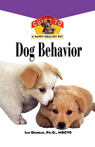 Book cover: "Dog Behavior" with two adorable puppies pictured.