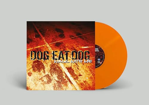 Orange vinyl record with album cover showing footprints and text.