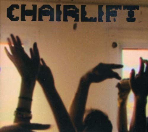 Chairlift album cover: raised hands silhouetted against a bright, blurred background.