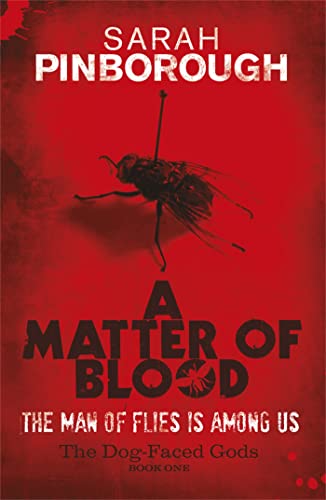 Red book cover with a large fly and bold white title text.