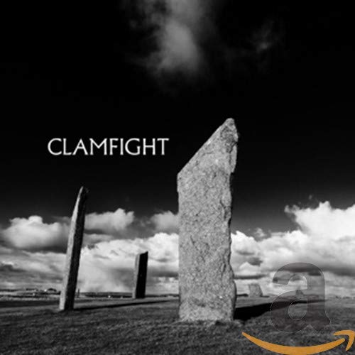Black and white CD cover with standing stones and cloudy sky.