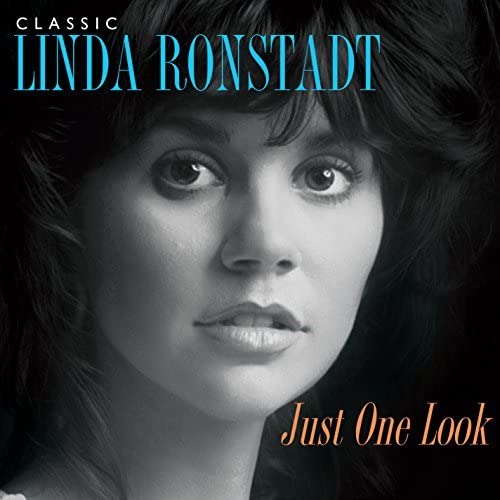 Close-up portrait of Linda Ronstadt, with album title “Just One Look”.