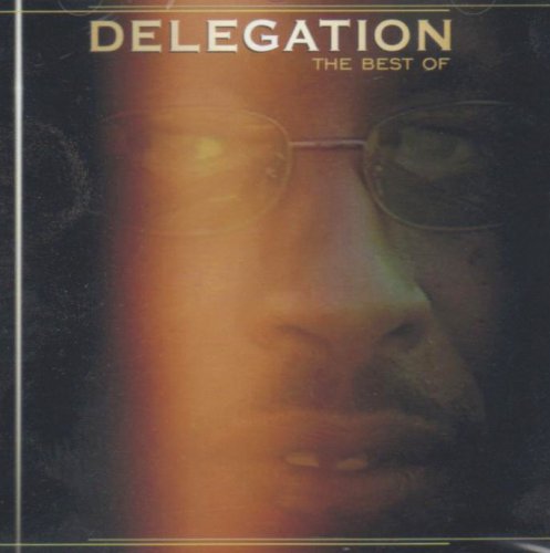 CD cover for Delegation’s “The Best Of,” featuring a man with glasses.