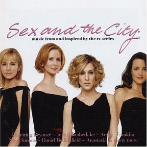 The four main actresses from Sex and the City posing on a white background.
