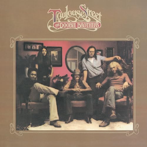 The Doobie Brothers album cover featuring five musicians in a room.