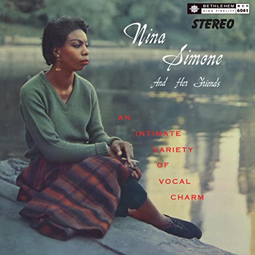 Nina Simone album cover, portrait of a woman by water.