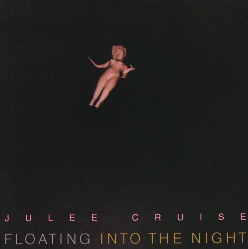 CD cover: a small doll floats against a dark background with text.