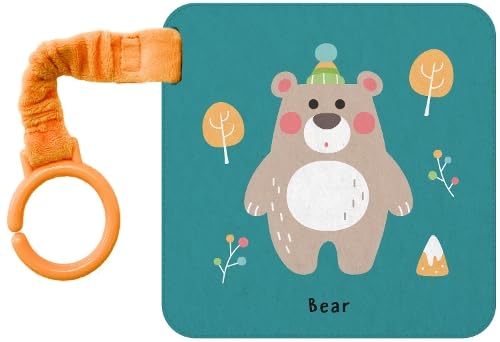 Soft cloth book with a bear illustration and orange teether ring.