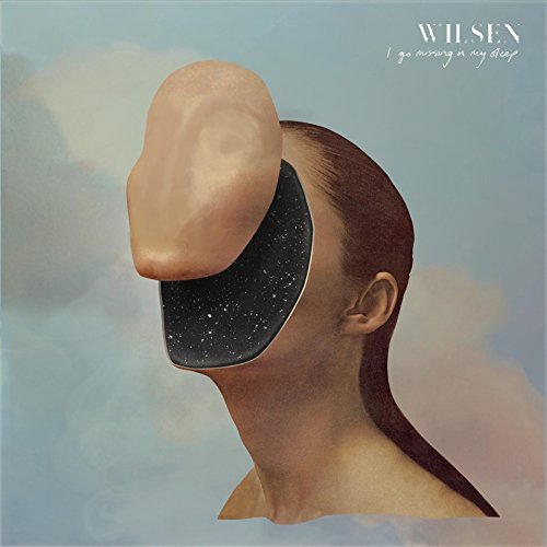 Album cover: head in profile with face partially obscured by a void.