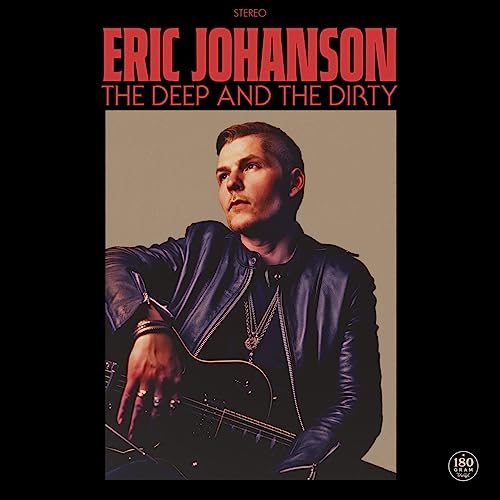 Eric Johanson album cover featuring a man with a guitar.