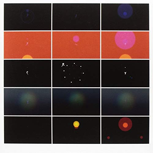 Album cover with a grid of abstract, colorful, glowing shapes and figures.