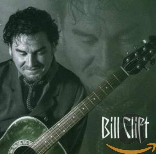 Black and white portrait of Bill Clift with an acoustic guitar.