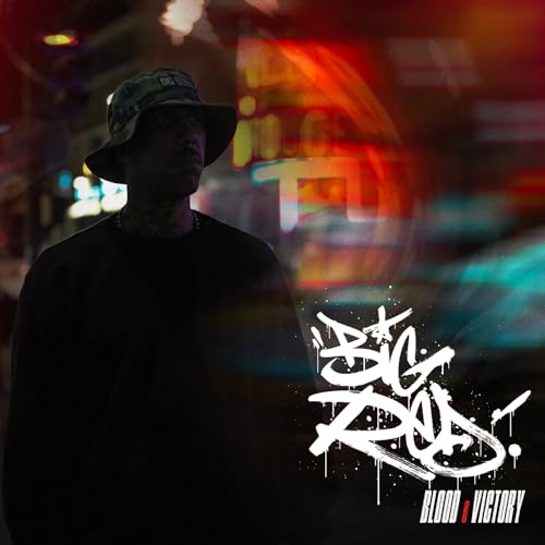 Man in a bucket hat with graffiti-style text overlay.