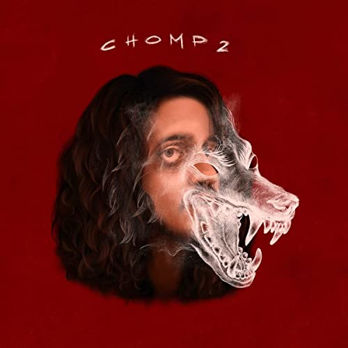 Album cover: a person’s face merging with a canine skull, red background.