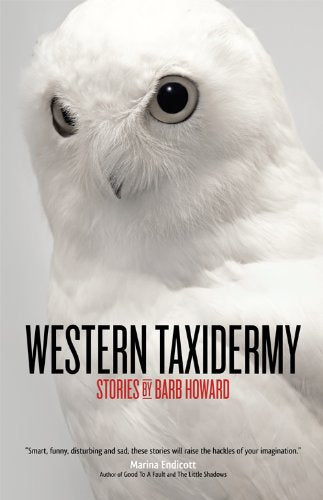 Book cover featuring a close-up of a snowy owl with dark eyes.