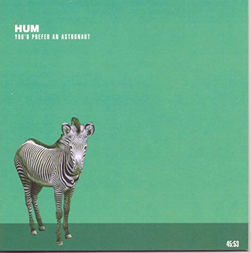 CD cover: green background with a zebra and band name "HUM".