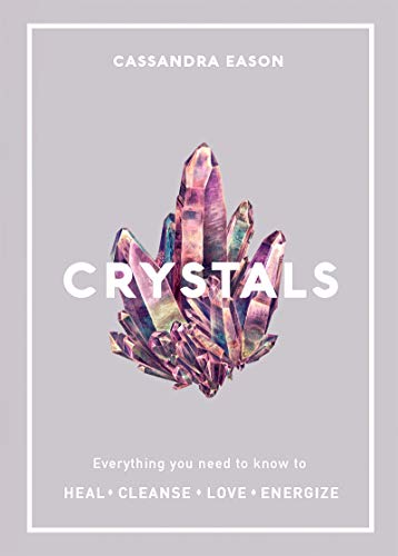 Book cover featuring amethyst crystals and white text reading "Crystals.