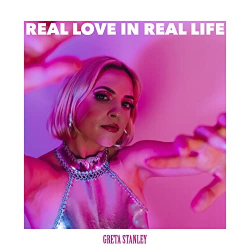 Greta Stanley album cover, portrait of a woman in pink lighting.
