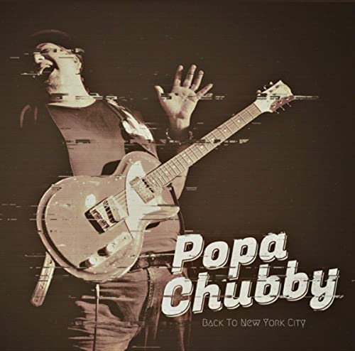 Popa Chubby playing guitar, album cover with distorted visual effects.