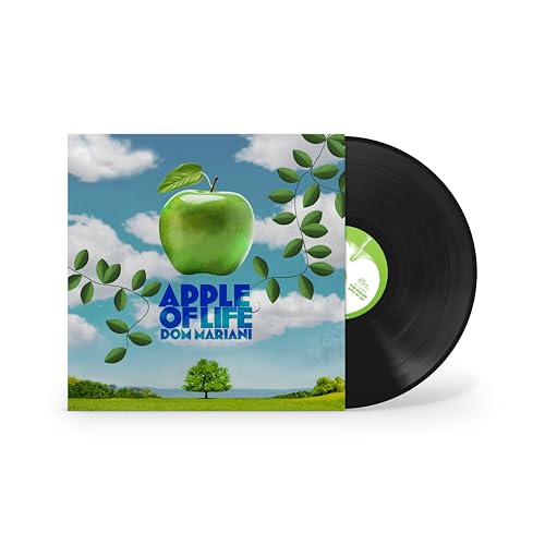 Vinyl record with album cover featuring a green apple and blue sky.