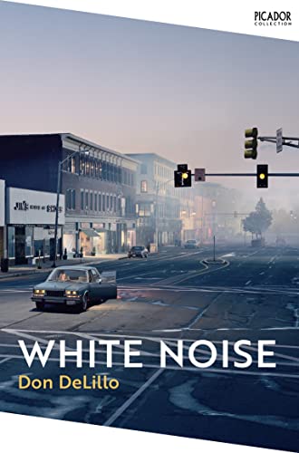 Book cover showing a car at an intersection in a foggy, dim town street.