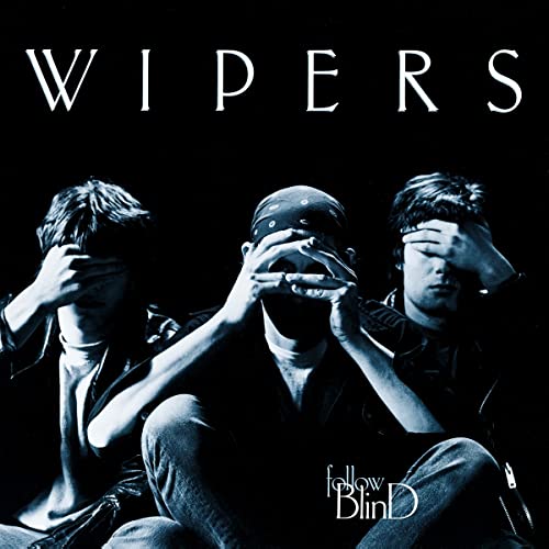 Wipers album cover: three men covering their eyes in darkness.