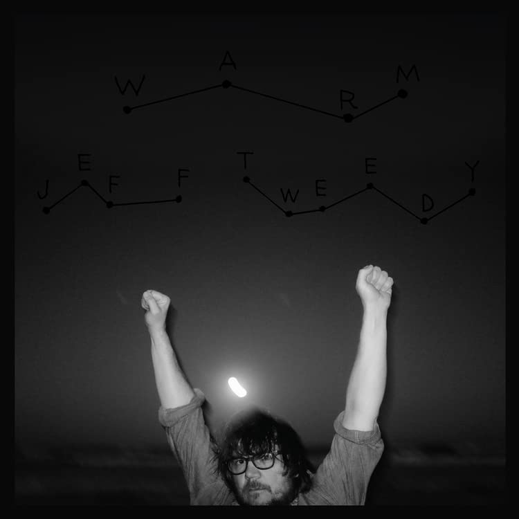 BlackL Black and white cover showing a man with arms raised under constellation-style text.