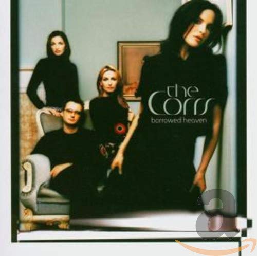 The Corrs album cover: four figures in dark clothing, indoor setting.