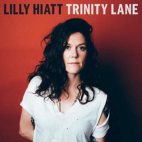 Lilly Hiatt album cover: portrait of a woman with dark curly hair.