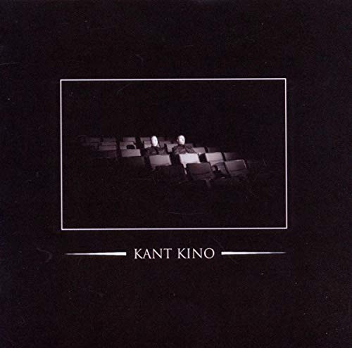 Dark image of a movie theater with figures, album cover for Kant Kino.