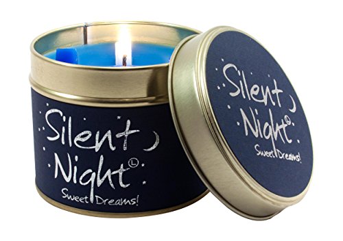 Blue scented tin candle with “Silent Night” text and open lid.
