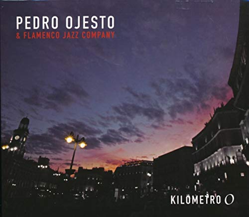 CD cover for Pedro Ojesto’s “Km.0” with a sunset cityscape.