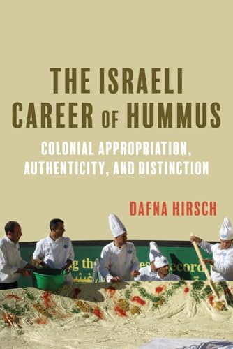 Book cover with title, author, and chefs preparing food in background.
