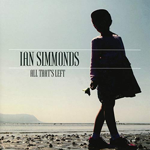 CD cover: young person with flower on a beach, looking away.