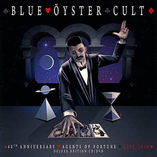 Blue Öyster Cult album cover featuring a man in a suit with mystical imagery.