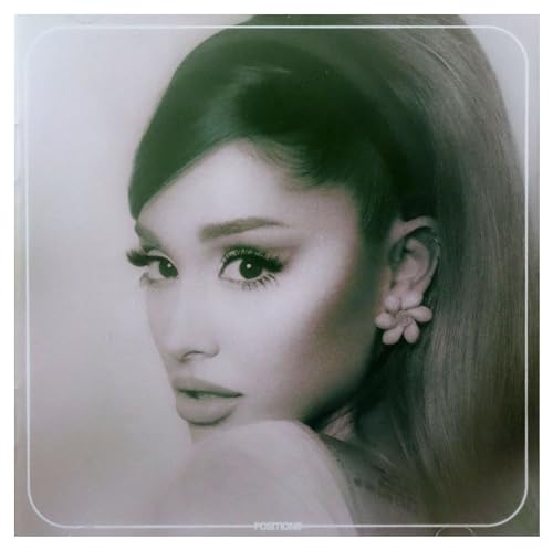Close-up of Ariana Grande with long hair, looking directly at the viewer.