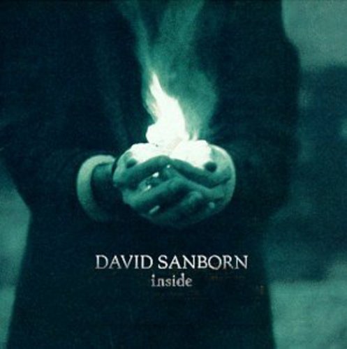 CD cover: hands holding a lit candle with "David Sanborn inside" text.