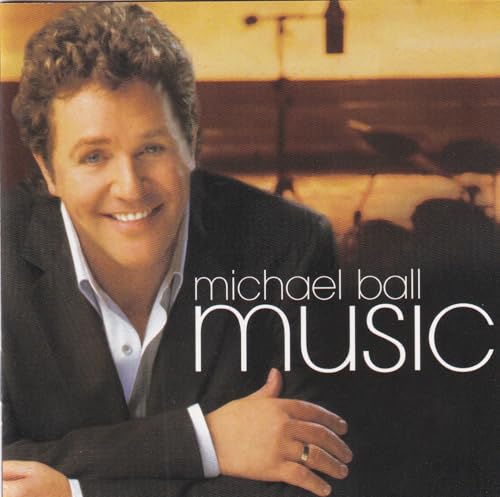 Michael Ball album cover, portrait of a smiling man in a suit.